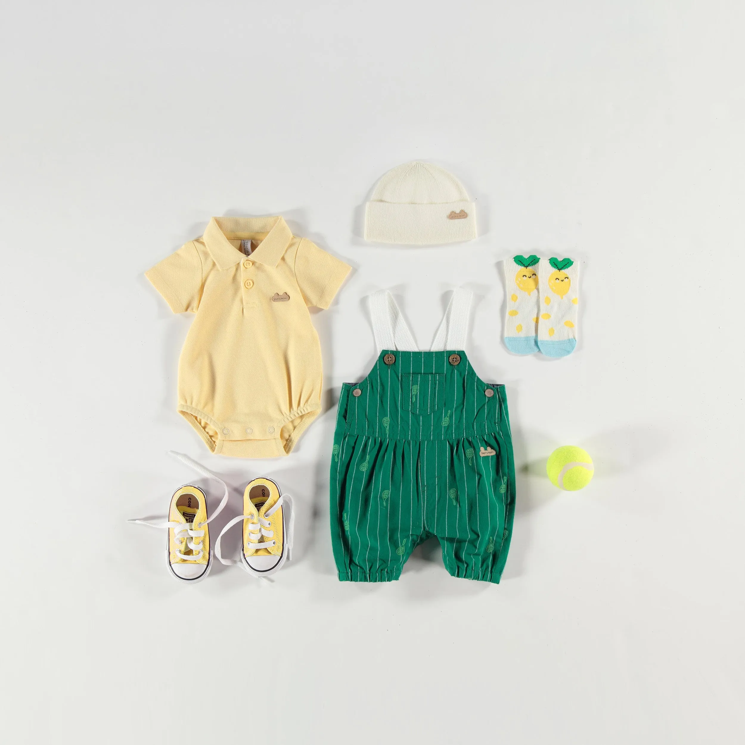 Cache-couche jaune en piqué avec col polo, naissance || Yellow bodysuit in piqué with polo neck, naissance