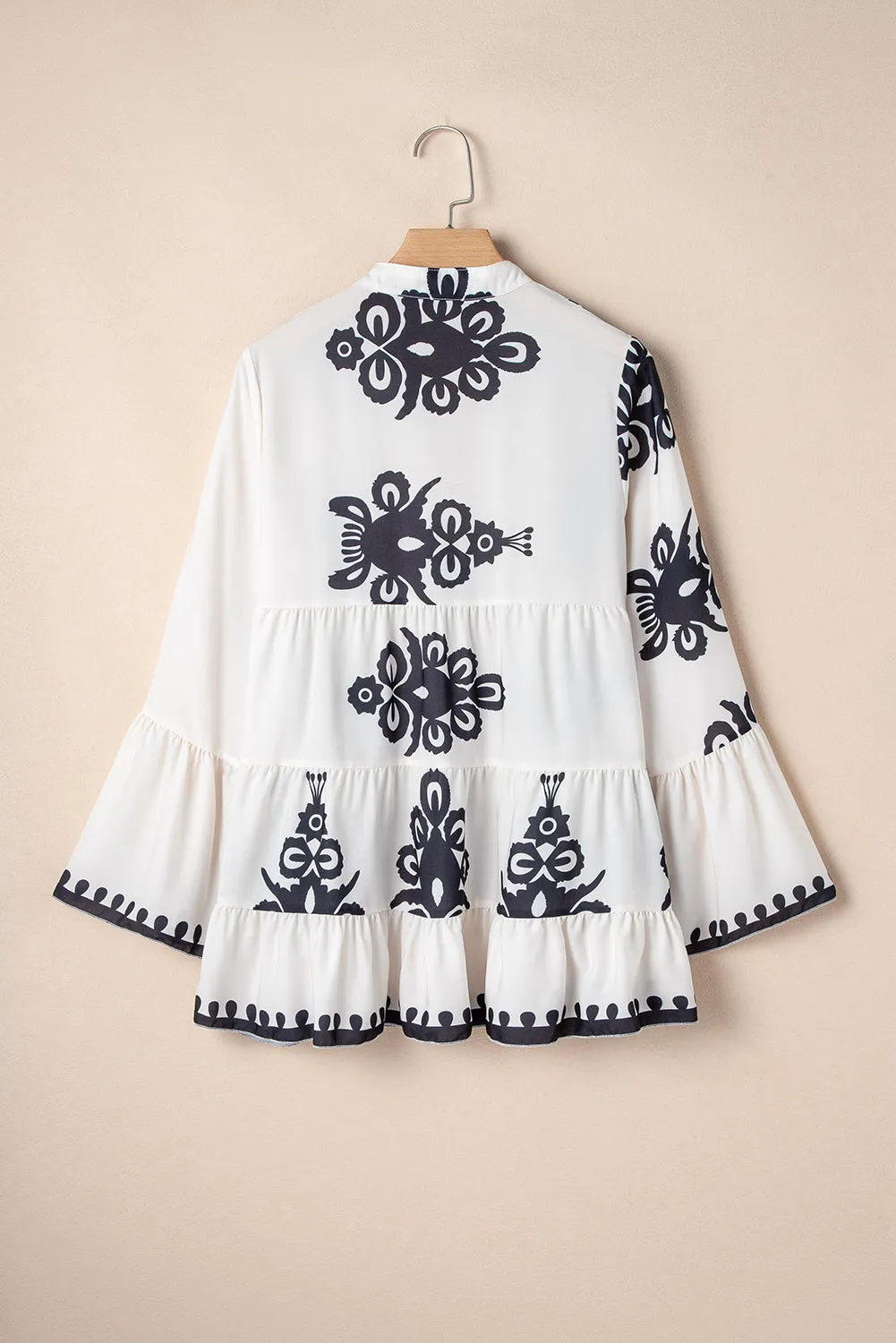 KaleaBoutique Stylish Abstract Printed Bell Sleeve Buttoned Tiered Babydoll Blouse