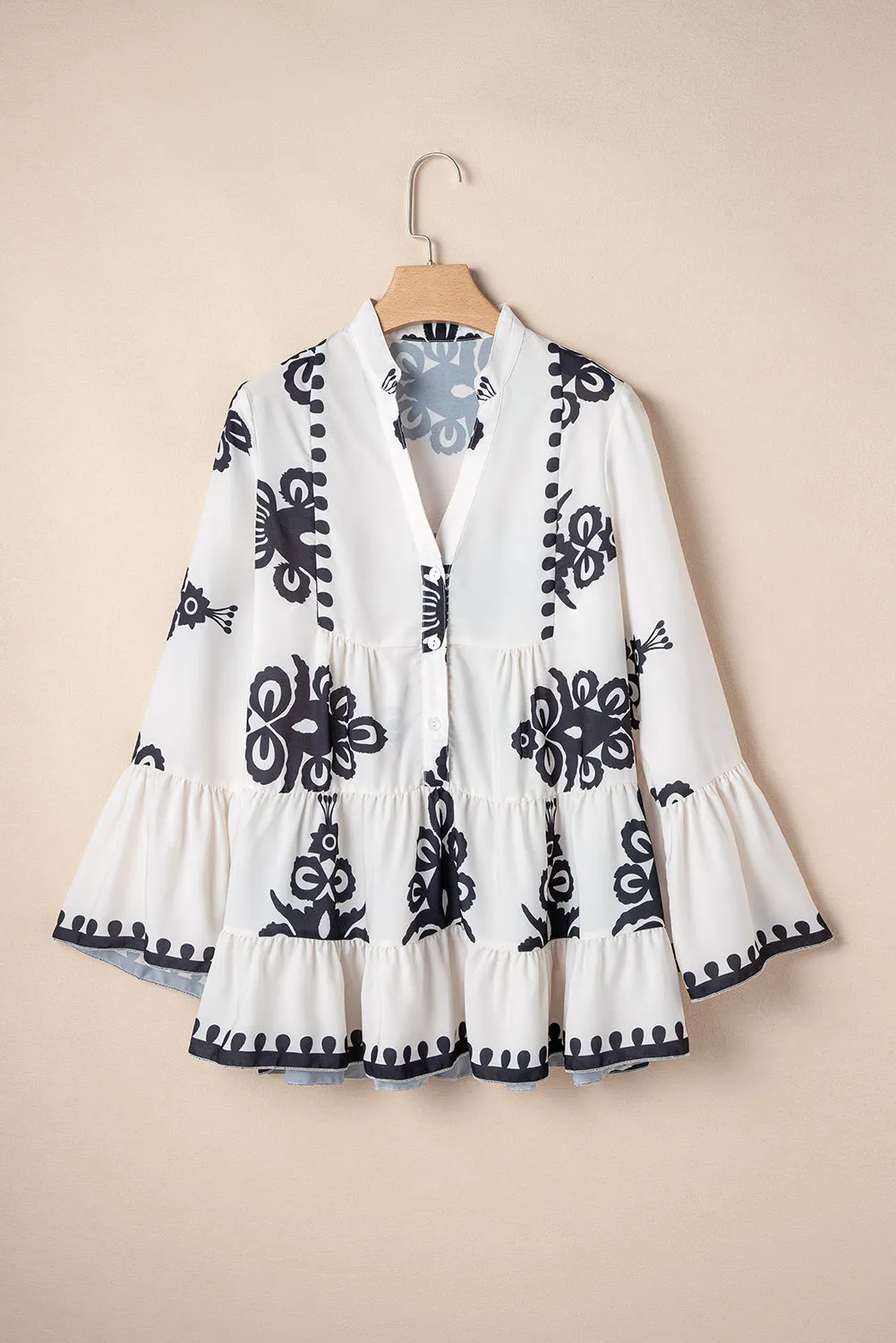 KaleaBoutique Stylish Abstract Printed Bell Sleeve Buttoned Tiered Babydoll Blouse